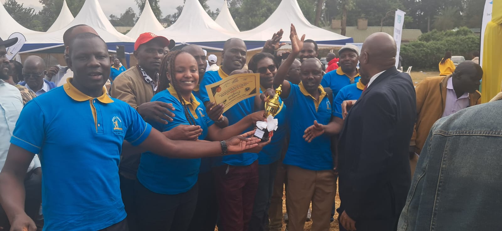 MUST SACCO members celebrate the prestigious county award